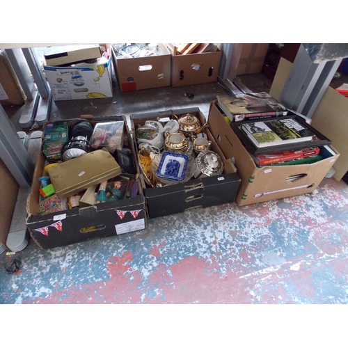 267 - THREE BOXES CONTAINING MIXED GLASSWARE, CHINA, DOLLS, BOOKS ETC