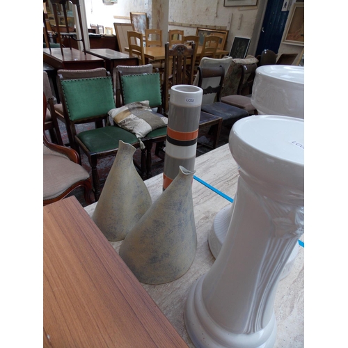 290 - FIVE ITEMS TO INCLUDE TWO ART VASES, TWO JARDINIERE STANDS AND A VASE