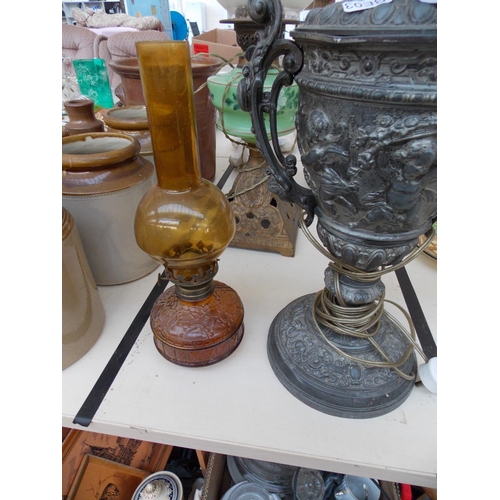 355 - FOUR VINTAGE OIL LAMPS