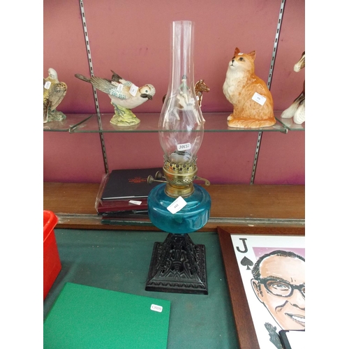 443 - A VICTORIAN BLUE GLASS OIL LAMP