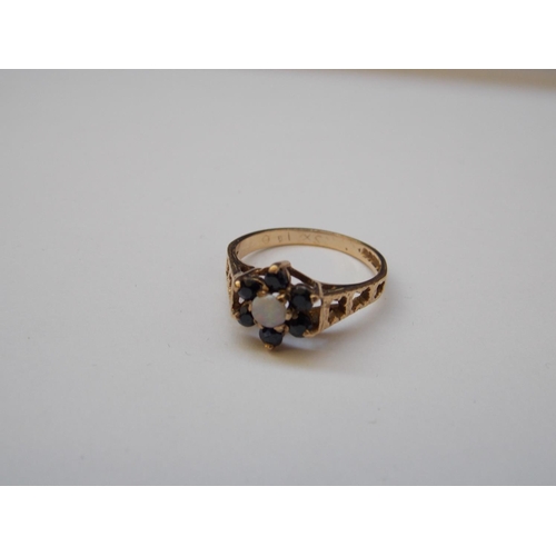 476 - A 9 CARAT GOLD OPAL AND SAPPHIRE RING - SIZE O 1/2