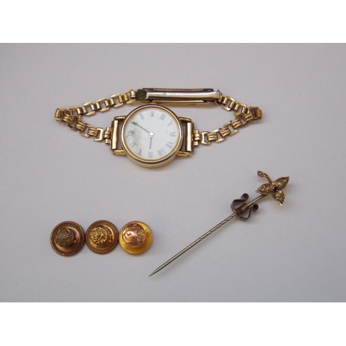 480 - A LADIES WRISTWATCH, A GOLD COLOURED STICK PIN AND THREE GENTS SHIRT STUDS