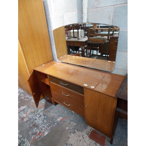 536 - AN AUSTINSUITE RETRO TEAK HIGH GLOSS DRESSING TABLE WITH THREE DRAWERS AND TWO DOORS