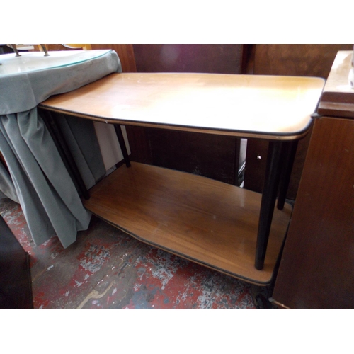 550 - AN ART DECO PIANO STOOL AND A TWO TIER DUMBWAITER