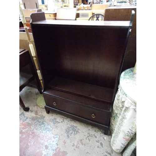 557 - A STAG MAHOGANY BOOKCASE WITH ONE DRAWER