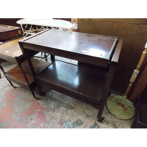 559 - A MAHOGANY DUMBWAITER