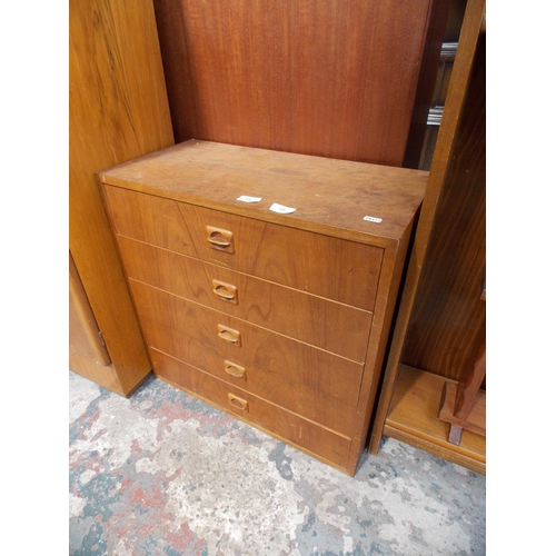 568 - A SMALL TEAK CHEST OF FIVE DRAWERS