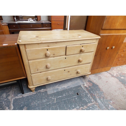 570 - A PINE CHEST OF TWO SMALL OVER TWO LONG DRAWERS