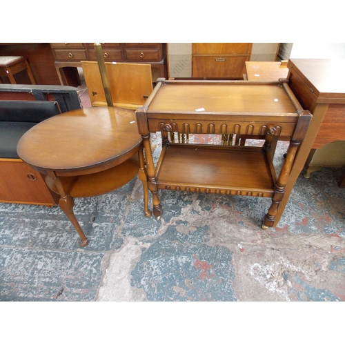 634 - AN OAK DUMBWAITER AND A ROUND OAK TABLE