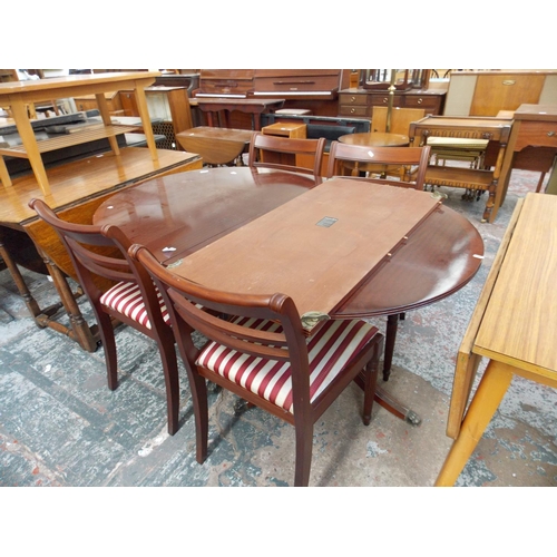 648 - A MEREDEW MAHOGANY DINING TABLE WITH FOUR MATCHING REGENCY STRIPED CHAIRS