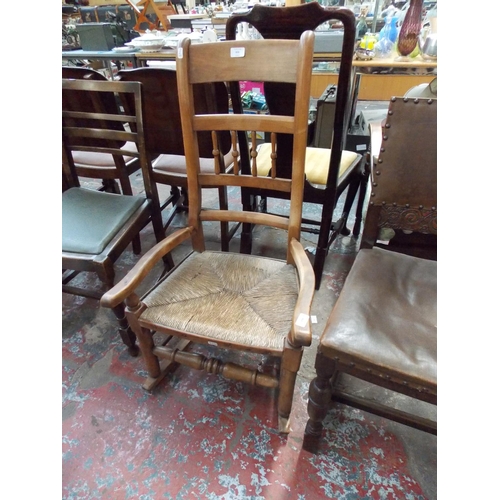 659 - AN ELM ROCKING CHAIR