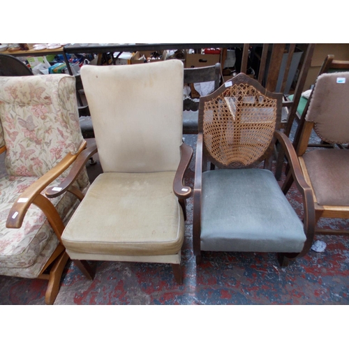 663 - A BEIGE UPHOLSTERED OCCASIONAL CHAIR AND A RATTAN BACKED BEDROOM CHAIR