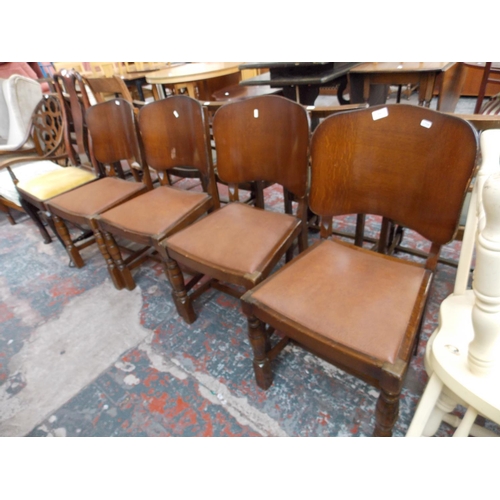 672 - FOUR 1930'S OAK LEATHERETTE DINING CHAIRS