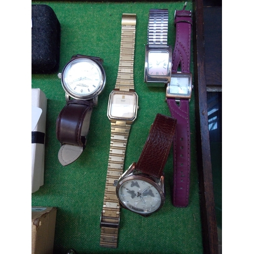 493 - THREE MENS WATCHES, THREE LADIES WATCHES AND A JEWELLERY BOX WITH CONTENTS