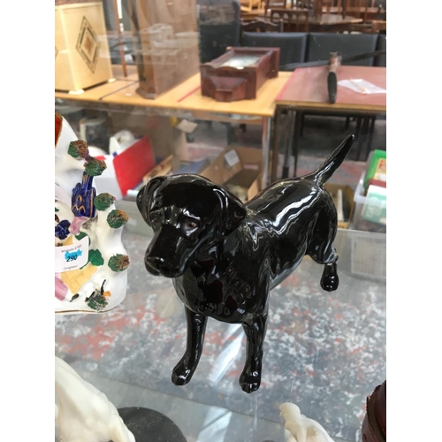 322 - A ROYAL DOULTON BLACK LABRADOR A/F