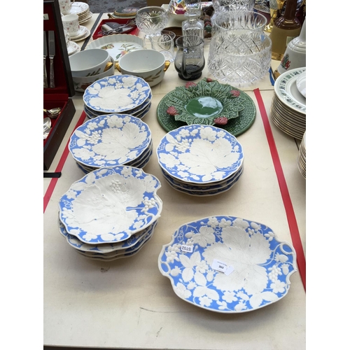 389 - A COLLECTION OF BISQUE LEAF PLATES AND TWO PORTUGAL PLATES