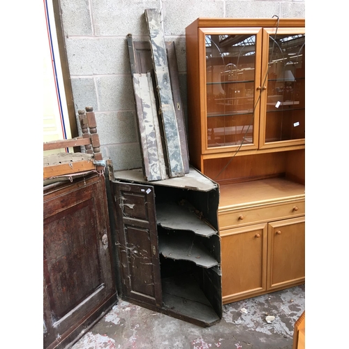 545 - A GEORGIAN OAK CORNER CABINET IN NEED OF REPAIR TOGETHER WITH A GEORGIAN OAK WALL CORNER CABINET AND... 