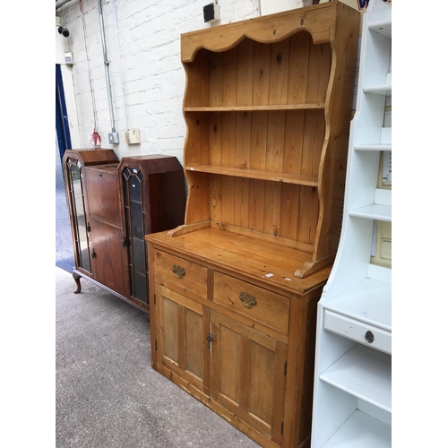 548 - A PINE DRESSER WITH TWO LOWER DOORS, TWO DRAWERS AND AN UPPER PLATE RACK