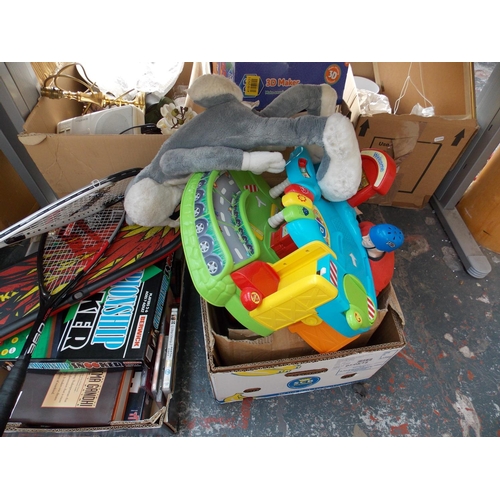 235 - FIVE BOXES CONTAINING MAGAZINES, SQUASH RACKETS, CHILDRENS TOYS ETC