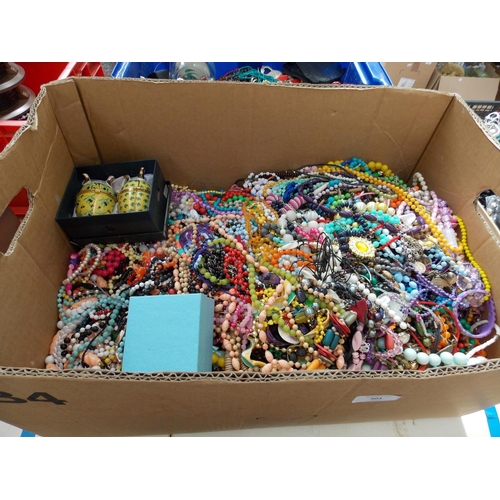 303 - TWO BOXES CONTAINING A LARGE QUANTITY OF MIXED COSTUME JEWELLERY