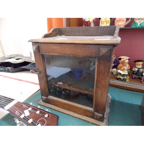 421 - A VINTAGE OAK SMOKERS CABINET