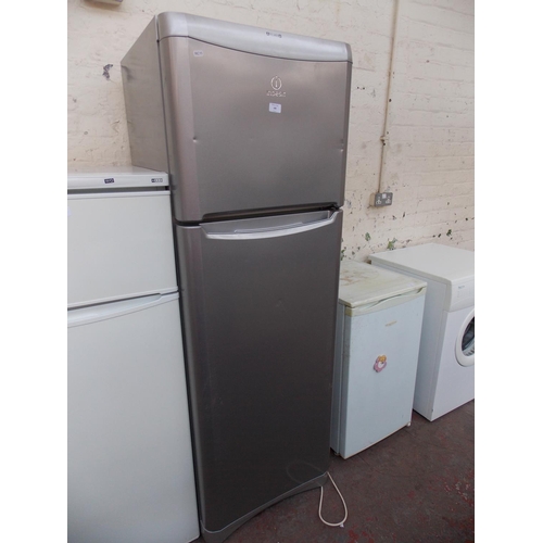 184 - A GREY INDESIT A PLUS CLASS UPRIGHT FRIDGE FREEZER