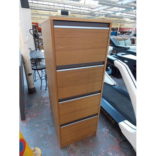 30 - A WOOD EFFECT FOUR DRAWER OFFICE FILING CABINET