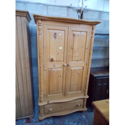 541 - A GOOD QUALITY MODERN PINE DOUBLE WARDROBE WITH A LOWER DRAWER