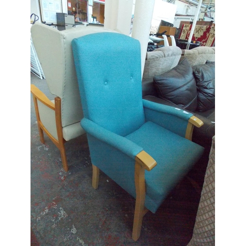 679 - A BLUE LEATHERETTE OCCASIONAL CHAIR AND A BEECH FRAMED CREAM UPHOLSTERED WINGBACK ARM CHAIR