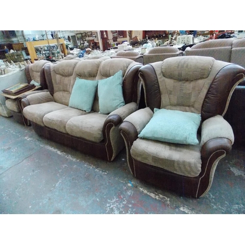 680 - A GOOD QUALITY ITALIAN THREE PIECE LOUNGE SUITE COMPRISING OF TWO ARM CHAIRS AND A THREE SEATER SOFA