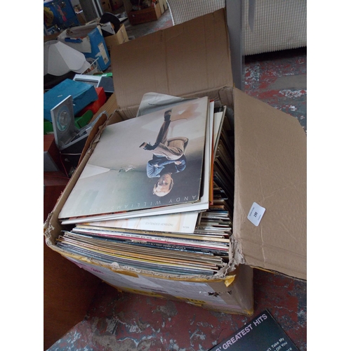 156 - SIX BOXES CONTAINING GLASSWARE, PICTURES, RADIOS, CASSETTES, OIL LAMP, FOOT STOOL, TRAYS ETC