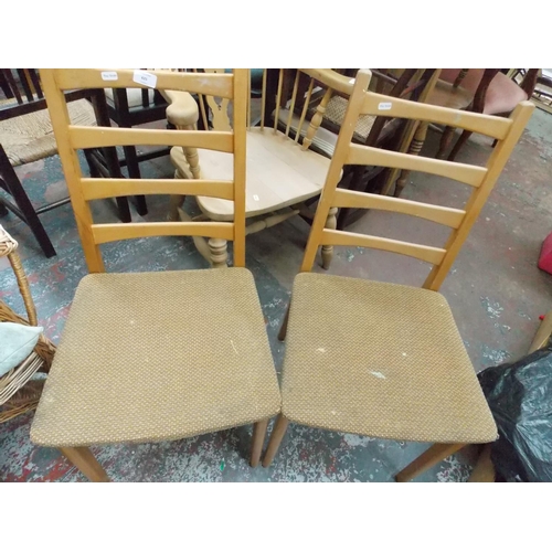 389 - TWO LADDER BACK CHAIRS