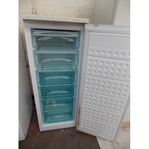 105 - A SWAN SR5030 UPRIGHT FREEZER W/O