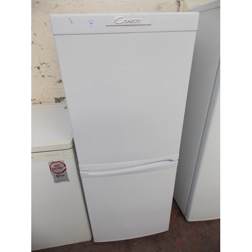 106 - A CANDY UPRIGHT FRIDGE FREEZER (W/O)