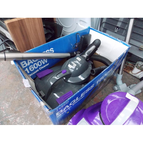 123A - TWO CYLINDER BAGLESS VACUUM CLEANERS TO INCLUDE A VAX POWER MIDI AND A TESCO 1600W (W/O)