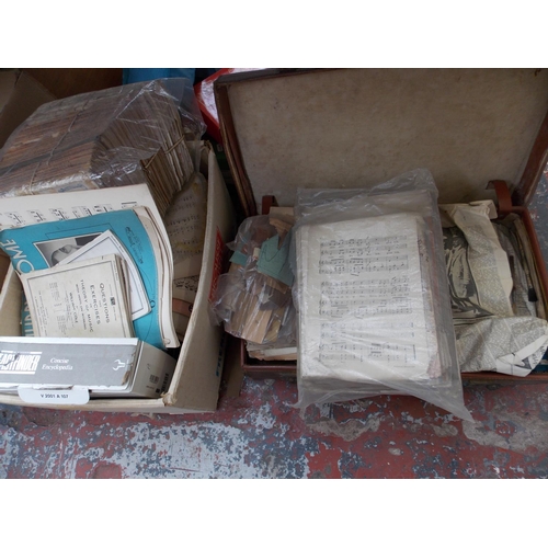 156 - SIX BOXES CONTAINING GLASSWARE, PICTURES, RADIOS, CASSETTES, OIL LAMP, FOOT STOOL, TRAYS ETC