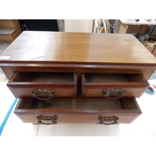 165 - A MINIATURE SATINWOOD CHEST OF DRAWERS