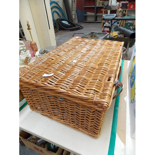 210 - A WICKER PICNIC BASKET WITH CONTENTS