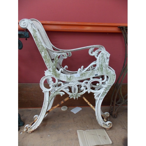 33 - A PAIR OF WHITE PAINTED CAST IRON ORNATE GARDEN BENCH ENDS