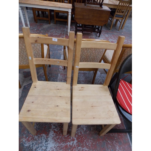 383 - A PAIR OF PINE KITCHEN CHAIRS