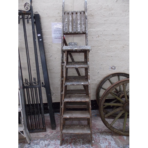 49 - TWO SETS OF VINTAGE WOODEN SIX STEP STEP LADDERS