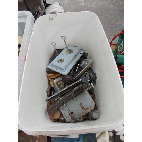 56 - TWO PLASTIC BOXES AND A METAL TOOL BOX CONTAINING DOOR FURNITURE, NAILS, VARIOUS TOOLS ETC