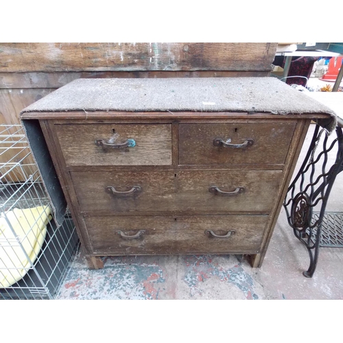 69 - A WOODEN CHEST OF FOUR DRAWERS WITH CONTAINING PAINT BRUSHES ETC