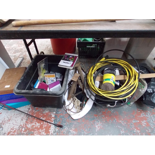 74 - A LARGE MIXED LOT OF BOXES CONTAINING CAR AXLE STANDS, DECORATING ITEMS, ELECTRICAL WIRING, TOOLS ET... 