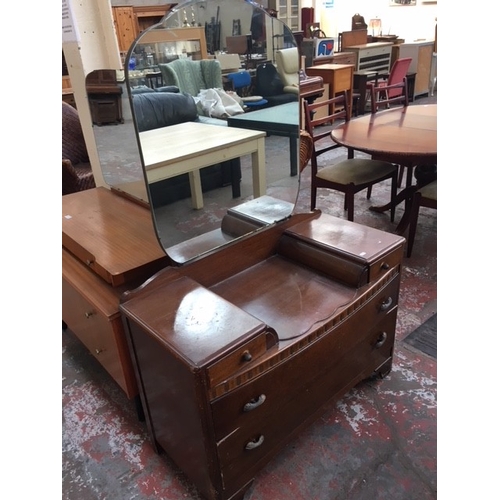 365 - THREE ITEMS TO INCLUDE A TEAK DRESSING TABLE, WICKER CHAIR AND AN OAK DRESSING TABLE