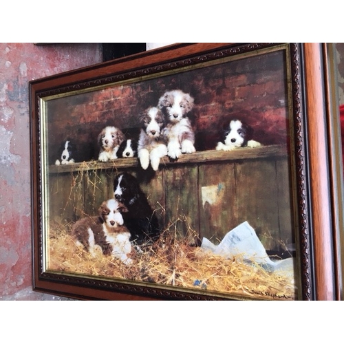 280A - TWO FRAMED PRINTS - ONE OF PUPPIES AND ONE OF A LONDON TRAM