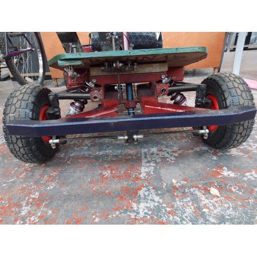 11 - A SCRATCH BUILT 2 STROKE FOUR WHEELED GO KART WITH INDEPENDENT FRONT SUSPENSION, NEW ENGINE AND SEAT... 