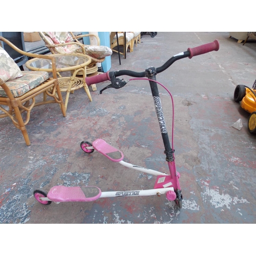 12 - A PINK AND WHITE SPORTER SCISSOR SCOOTER