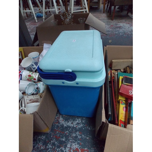 213 - THREE BOXES CONTAINING CURTAINS, GAMES, MIXED CHINA, GLASSWARE, ICE BOX ETC