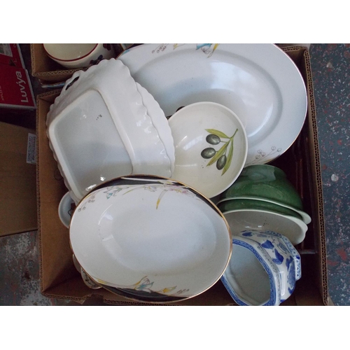 229 - FOUR BOXES CONTAINING MIXED CHINA, ELECTRICAL ITEMS, GLASSWARE, RADIO, ORNAMENTS ETC